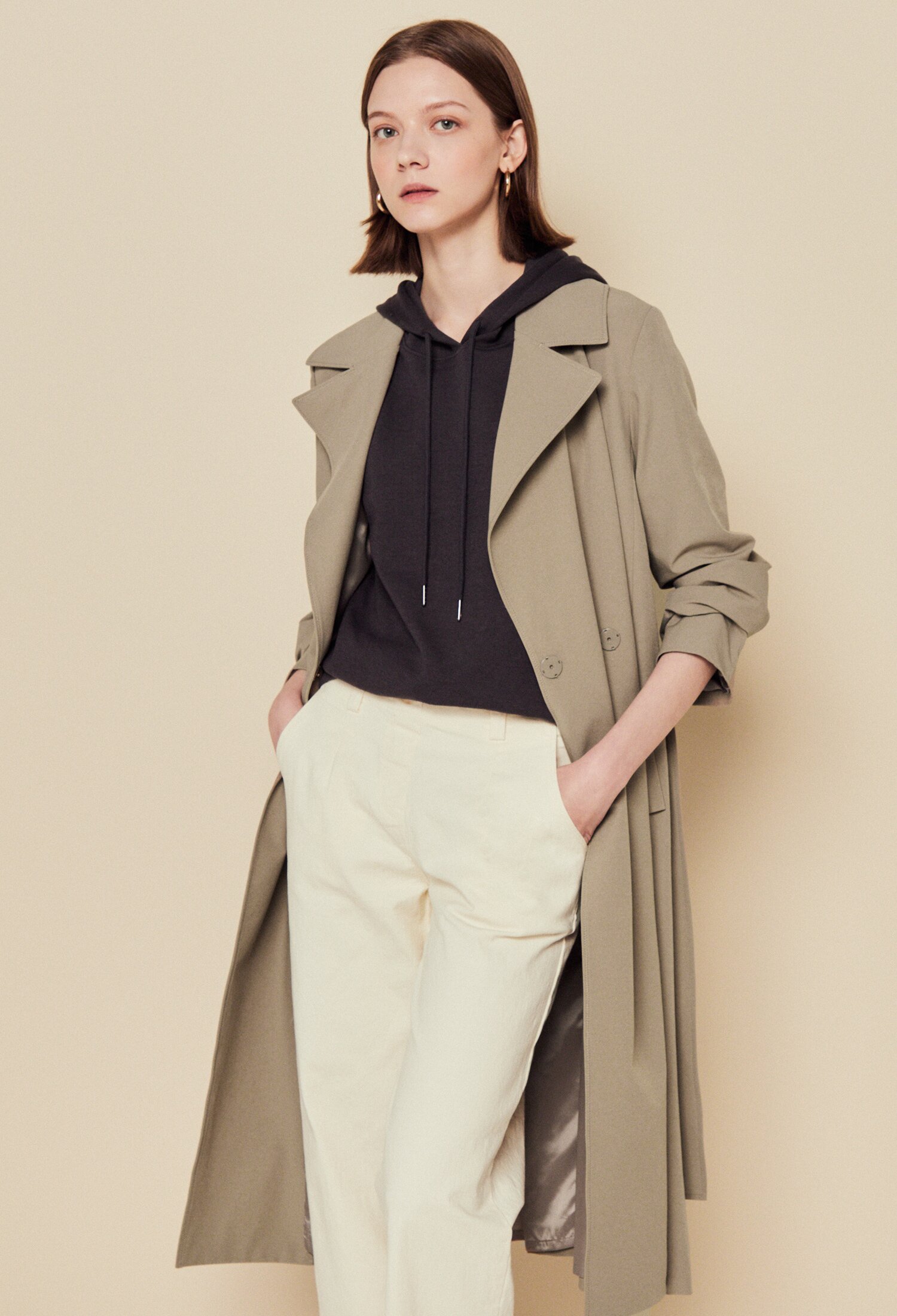Trench coat with hoodie and snakeskin boots