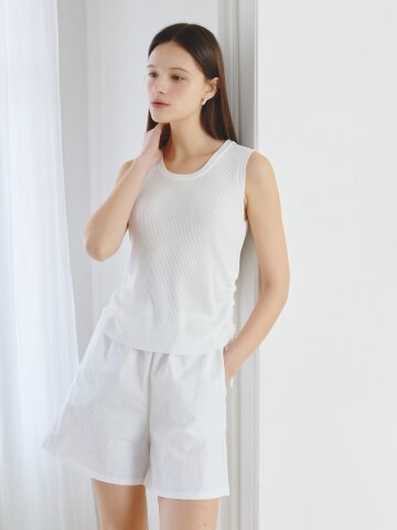 사이드 셔링 슬리브리스 니트 