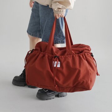 스트링 포켓 보스턴 트래블백 - brick red