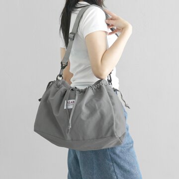 커들리 스트링 포켓 크로스백 - gray