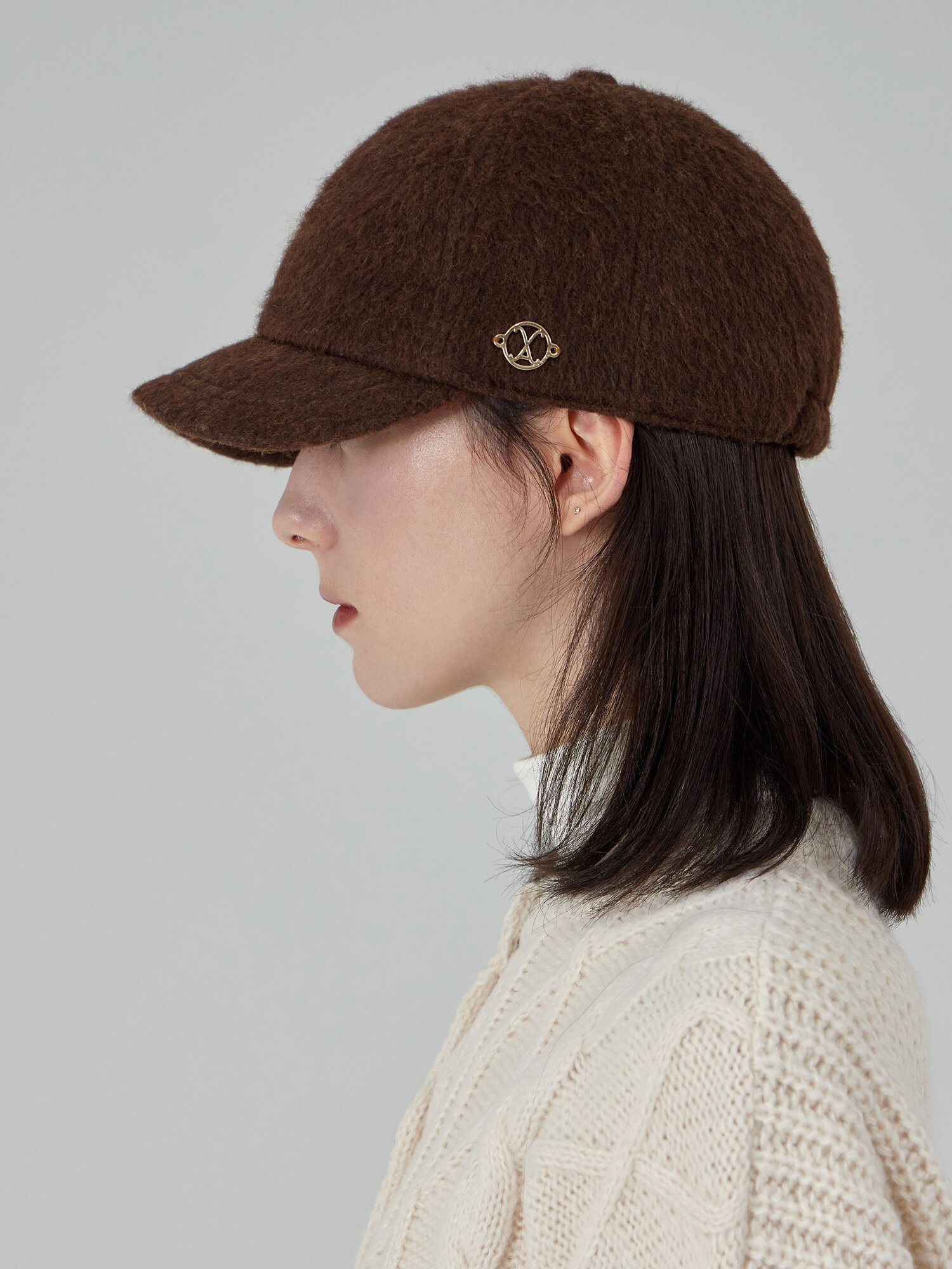 VA 커브드 서클 로고 뉴스보이캡 다크 브라운