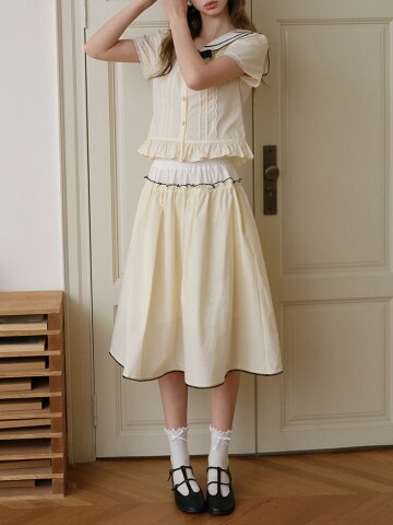 Cest_Yellow flare midi skirt
