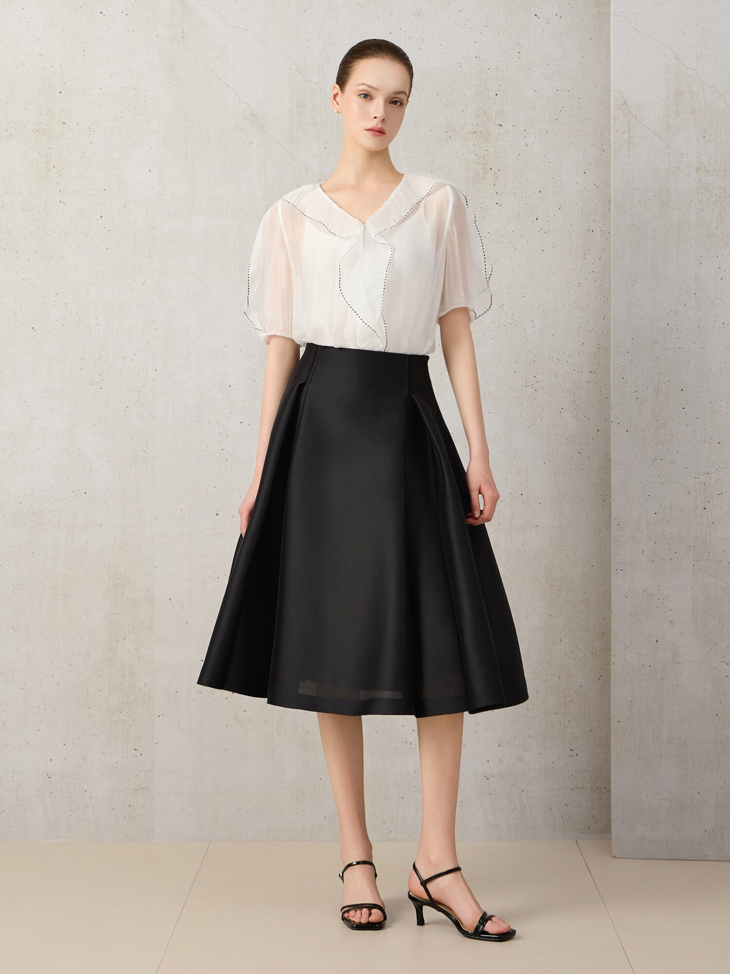 턱 A라인 미디 스커트 (BLACK)