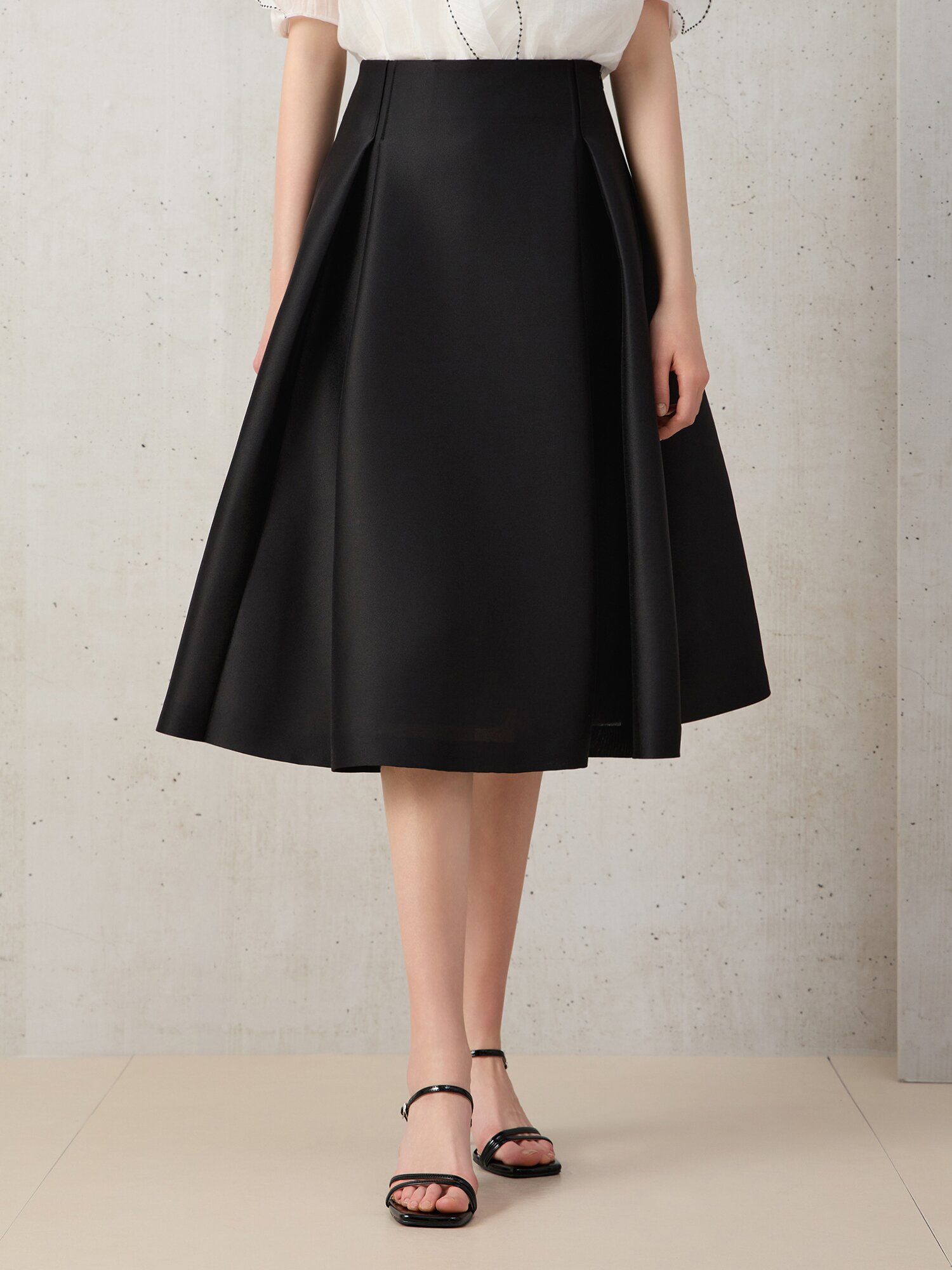 턱 A라인 미디 스커트 (BLACK)