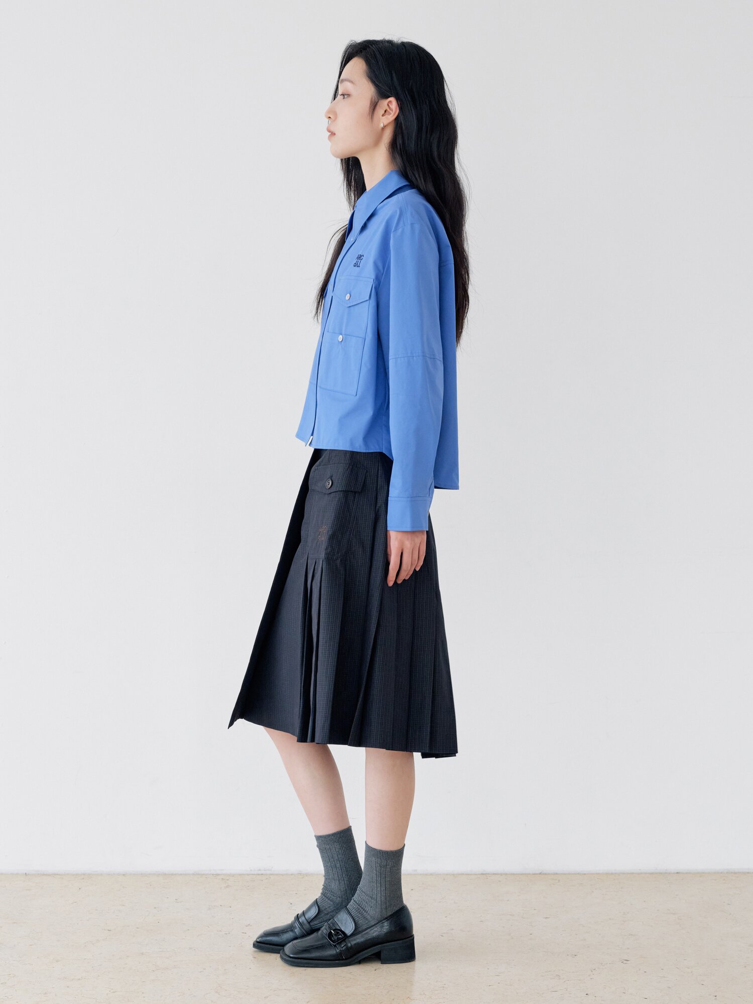 체크 포켓 랩 플리츠 스커트 (CHECK NAVY)