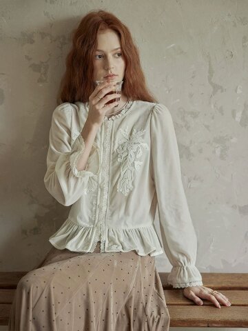 PM_Embroidered peplum blouse